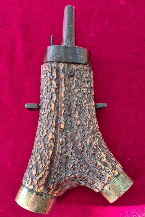 A Superb German 17thC carved stag horn powder flask portraying a beheaded Holofernes.  Ref 3080